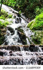 Waterfall flows down the rock.