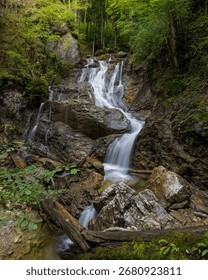 a waterfall in the forest 