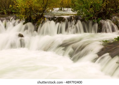 Waterfall in the forest near Plitvice National Park in Croatia - Shutterstock ID 489792400