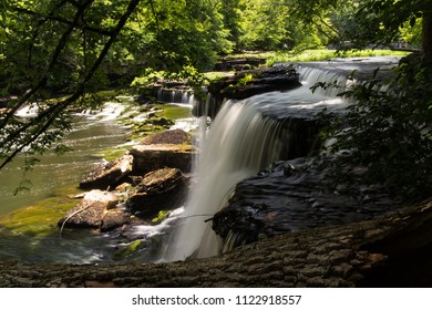 A Waterfall In A Forest.  Old Stone Fort State Archaeological Park, Manchester, TN, USA.