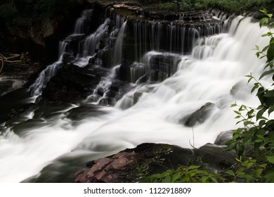 A Waterfall In A Forest.  Old Stone Fort State Archaeological Park, Manchester, TN, USA.