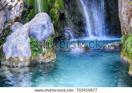 Waterfall with green water pond, Las Fuentes del Algar, Alicante, Spain