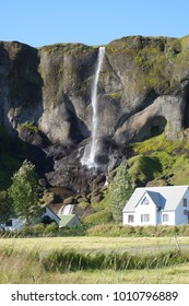 Waterfall And Farmer’s House (Iceland)