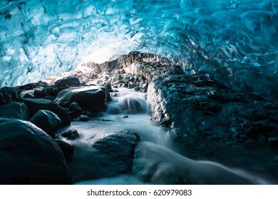Waterfall in an ice cave at Breidamerkurjokull. An outlet glacier of the larger glacier of Vatnajokull in southeastern Iceland