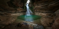 Waterfall Inside A Cave In The Mountain