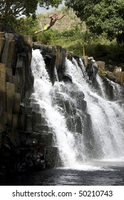 Waterfall Jump On Mauritius Island.