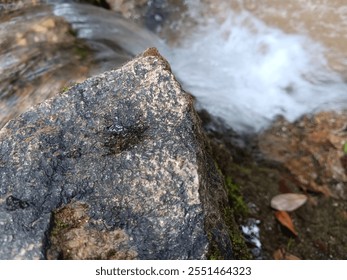Waterfall. Natural continuous waterstream with source from mountain.