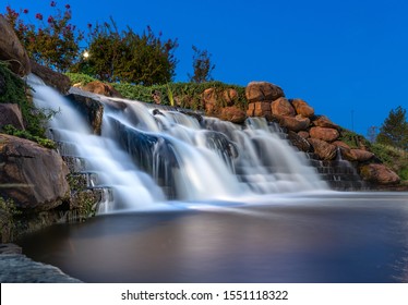 Waterfall in Oklahoma City park after sunset