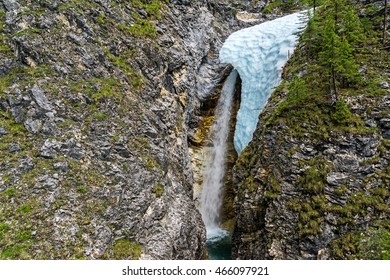 Waterfall on Marble creek in Tunka range, Siberia - Shutterstock ID 466097921