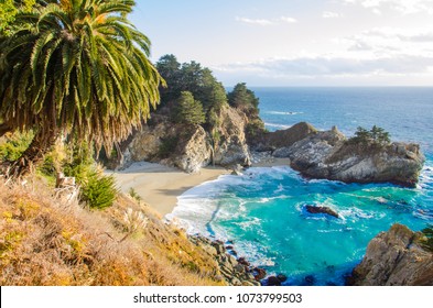 Waterfall on sand beach in Big Sur, CA - Powered by Shutterstock