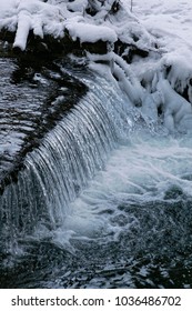 waterfall on a stream in winter