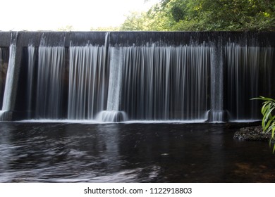 A Waterfall Over A Dam.  Old Stone Fort State Archaeological Park, Manchester, TN, USA.