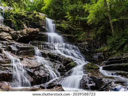 Waterfall Over Rocks in Shelving Rock Falls