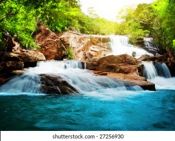 Waterfall In Rain Forest