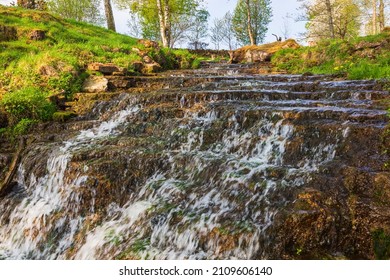 Waterfall in a ravine at spring