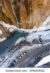 A Waterfall In The Snow. High Quality Photo. Shooting With A Drone. Vertical View. Chegem Waterfalls In Winter