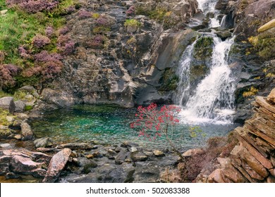 Waterfall In Snowdonia. Blue Water. Rowan Is On River.