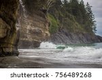 Waterfall spraying into the ocean, Mystic Beach, Vancouver Island.