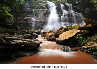 Waterfall In Spring Season Located In Deep Rain Forest Jungle. Mae Tad Waterfall, Chiang Mai, Thailand.