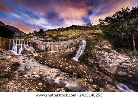 Waterfall at sunset in Sella