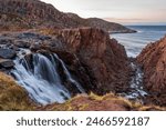 Waterfall in Teriberka, Murmansk region, Arctic Ocean, Russia, Far North, autumn