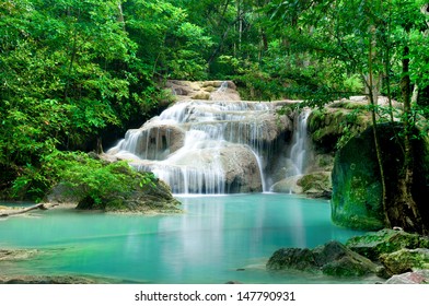 Waterfall in tropical forest at Erawan national park Kanchanaburi province, Thailand - Shutterstock ID 147790931