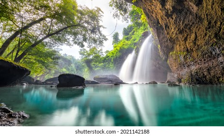 Waterfall in tropical forest at Khao Yai National Park, Thailand. Waterfall view from inside the cave. Amazing of Haew Suwat Waterfall Unseen Khao Yai National Park, Thailand. traveling ecotourism.