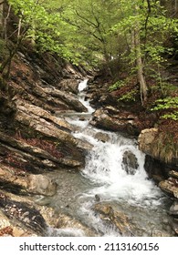 Waterfall Tumbling Down A Mountain Side