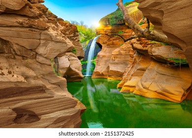 waterfall view in the canyon. wonderful rock forms created by erosion. View of the river in the canyon. waterfall landscape in nature. beautiful landscape in the red valley.  landscape photography. - Powered by Shutterstock
