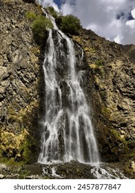 waterfall view with Cloudy Sky
