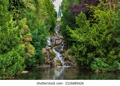 Waterfall in Viktoriapark in city of Berlin, Germany. Urban landscape park with manmade mountain in locality of Kreuzberg.
