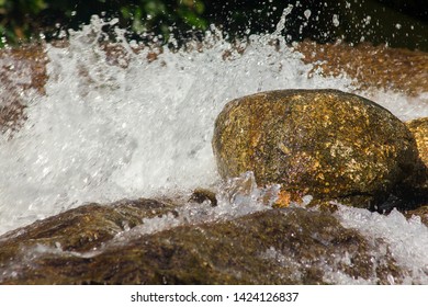 Waterfalls Bounce Off Rocks In The Natural Forest.