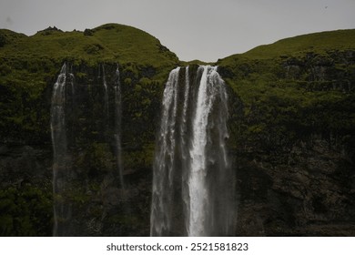 Waterfalls, Rocky Cliffs, Greenery, Houses  - Powered by Shutterstock