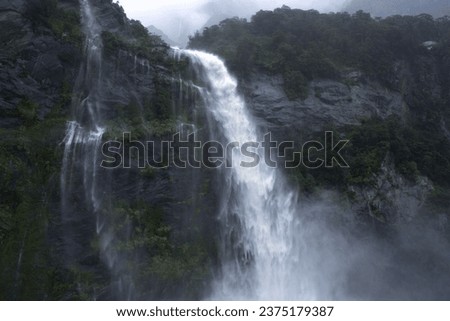 Waterfalls and Serenity in Milford Sound, Piopiotahi Scenic Landscape with Misty Mountains, Fiordland, Road Trip in New Zealand