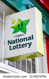 Waterford, Republic Of Ireland - August 14th 2018: A Sign Advertising The Irish National Lottery Above The Entrance To A Shop In The City Of Waterford In The Republic Of Ireland. 