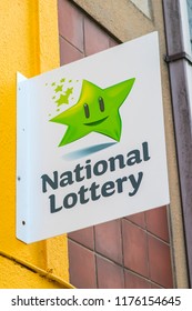 Waterford, Republic Of Ireland - August 14th 2018: A Sign Advertising The Irish National Lottery Above The Entrance To A Shop In The City Of Waterford In The Republic Of Ireland. 