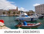 The waterfront of the historic coastal city of Split in Dalmatia, Croatia. This part of the waterfront is known as Riva. The Cathedral of Saint Domnius bell tower is background centre