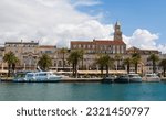 The waterfront of the historic coastal city of Split in Dalmatia, Croatia. This part of the waterfront is known as Riva. The Cathedral of Saint Domnius bell tower is centre right