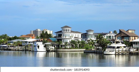 Waterfront homes, timeshares and condos along Matanzas Pass waterways, steps away from Times Square in Fort Myers Beach, Florida, USA.