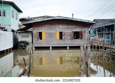 Waterfront House,brown Old Wooden House