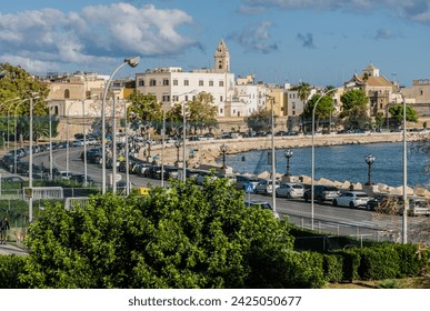 Waterfront of Lungomare Imperatore Augusto street in Bari with harbour in the background. Bari, Puglia region (Apulia), southern Italy, Europe, 
