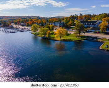 Waterfront of Meredith Bay in Lake Winnipesaukee at Meredith town center aerial view with fall foliage, New Hampshire NH, USA. 
