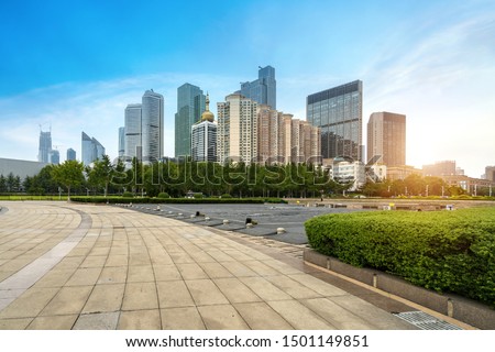 Waterfront Park Plaza and modern city buildings in Qingdao, China