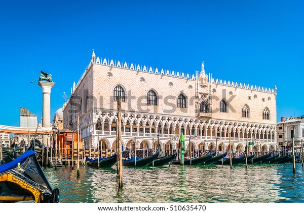 Waterfront view at Doge\'s Palace in famous Venice\
city, view from gondola ride. / Doge\'s Palace waterfront view. /\
Selective focus.