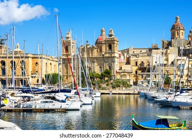 Waterfront of Vittoriosa Harbour and St. Lawrence's Church. Malta, Europe