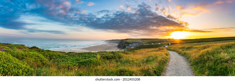 Watergate Beach panorama at sunrise in Cornwall. UK