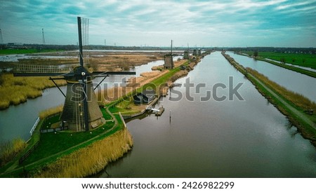 Waterlandscape of Kinderdijk in Holland with windmills