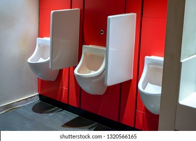 Waterless Urinals At Men Restroom.