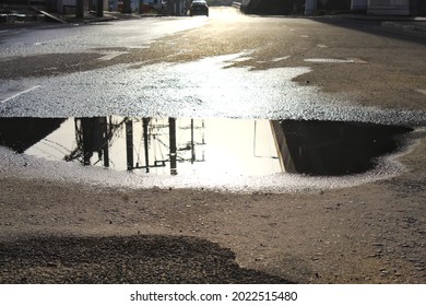 Waterlogging On The Surface Of The Road  Which Before Causing Harm To The Vehicle