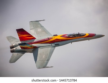 Waterloo, Ontario/Canada - July 8, 2019: Canadian Fighter Jet CF-18 flies over the Waterloo Airshow. The aircraft is a part of the Canadian Air Force Heritage Flight.